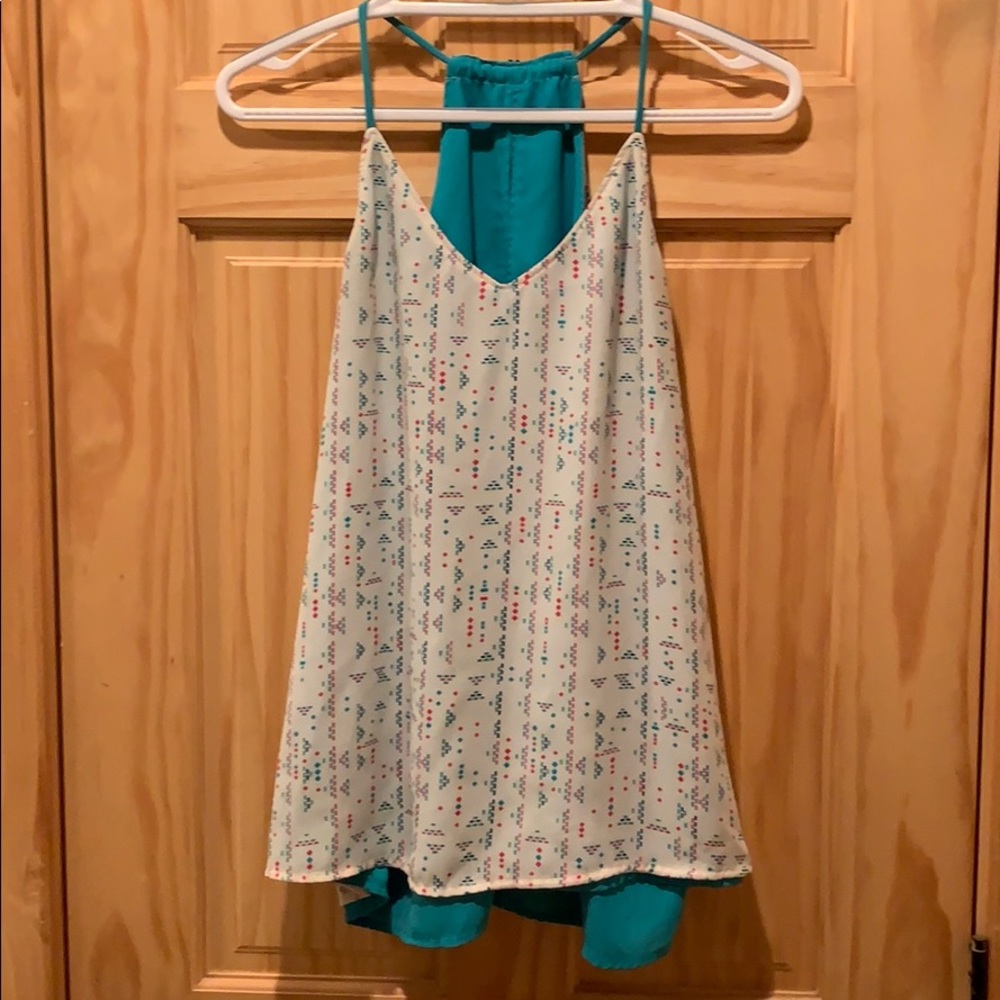 V-neck sleeveless tank. Reversible.